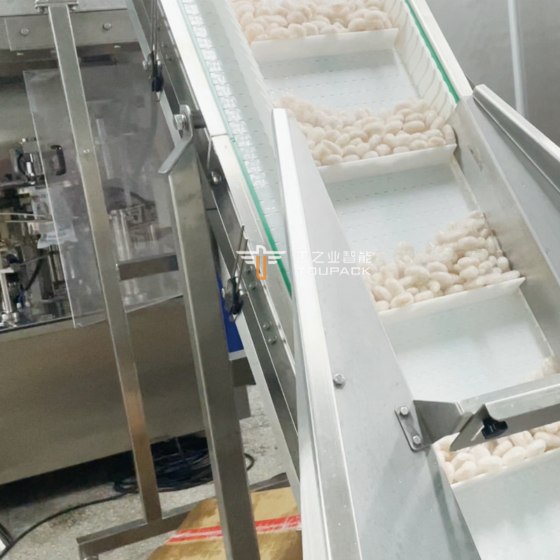 পপকর্ন চিকেন মাল্টি-ফাংশনাল অনিয়মিত আকারের ব্যাগিং মেশিন স্বয়ংক্রিয়ভাবে স্ট্যান্ড আপ পাউচ ফ্রোজেন পর্ক ডয়প্যাক প্যাকিং মেশিন